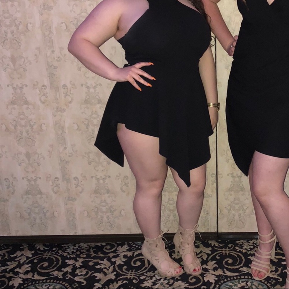 Black women’s romper with overlay skirt !